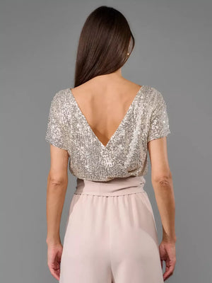 Shimmering sequin wide-leg jumpsuit with tie, apricot silver top and blush pants