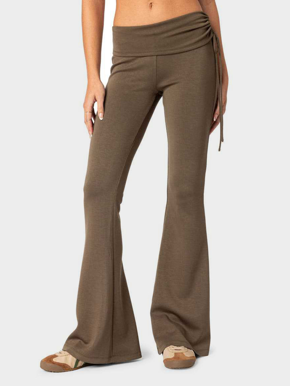 Drawstring waist flare trousers in coffee brown with a cinched detail and wide leg.