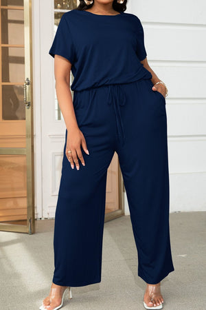 Dark Navy relaxed fit jumpsuit with short sleeves, drawstring waist, and wide legs.