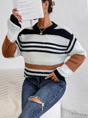 Colorblock stripe knit crewneck sweater in caramel, black, and white acrylic with a relaxed fit.