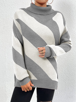 Gray and white diagonal stripe turtleneck knit sweater with ribbed cuffs and hem.