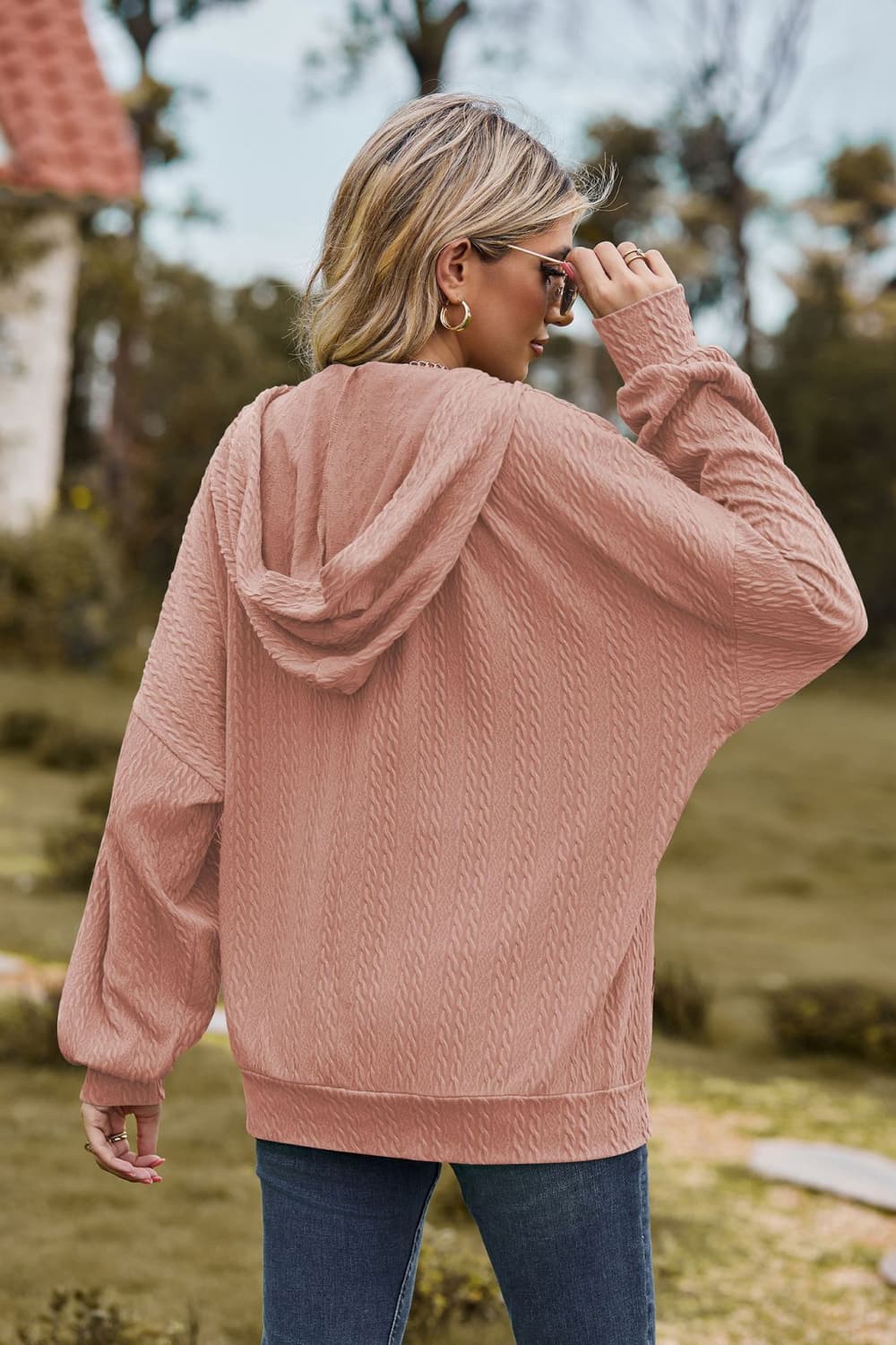 Textured cable knit hoodie in Dusty Pink with a relaxed fit and dropped shoulders.