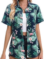 Button-up shirt with tropical hibiscus and flamingo print in dark blue, green, and pink.