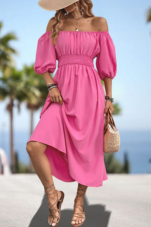 Pink off-shoulder puff sleeve empire midi dress with smocked waist and flowy skirt.