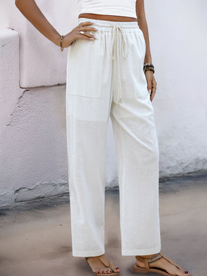 White linen-blend wide-leg trousers with drawstring waist and pockets