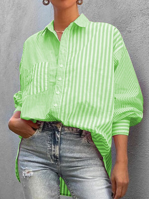 Oversized neon green striped button-down shirt with a pocket and cuffed sleeves.