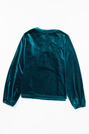 Gathered velvet henley blouse in deep teal with long balloon sleeves.