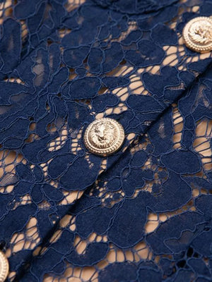 Navy lace midi dress with gold lion-embossed buttons and a nude lining.