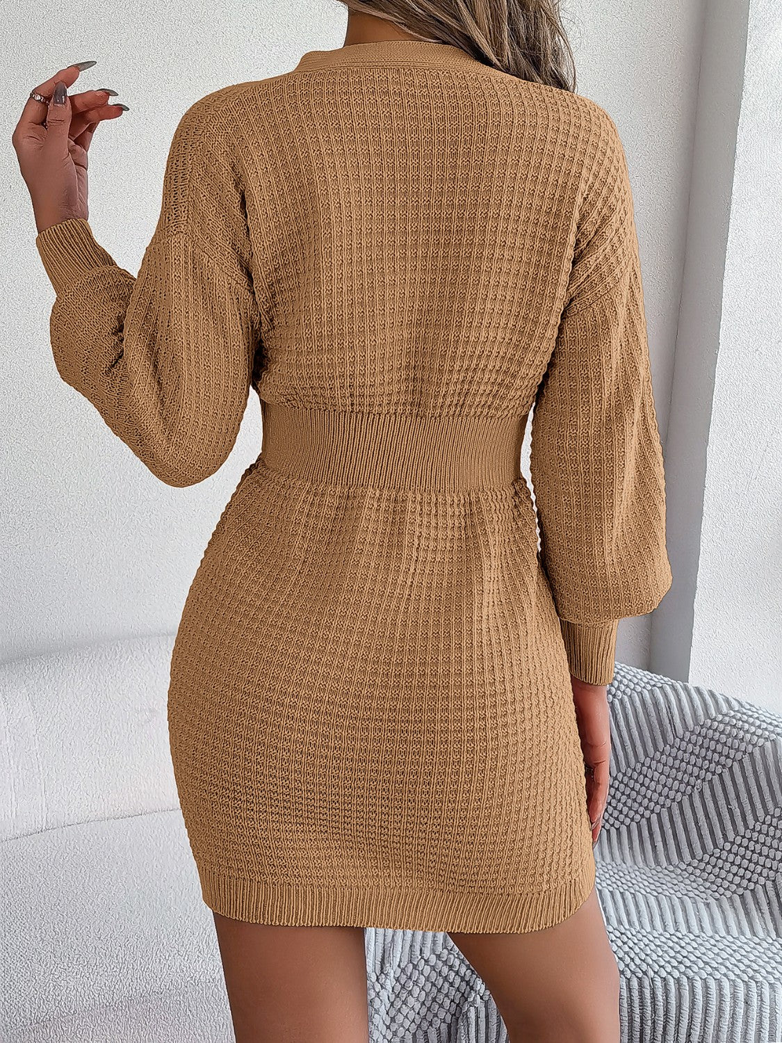 Khaki cable knit button-front dress with hourglass silhouette and ribbed waist detail