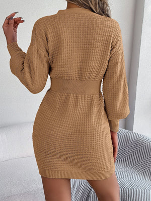 Khaki cable knit button-front dress with hourglass silhouette and ribbed waist detail