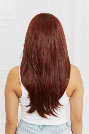 Layered copper red synthetic wig with subtle highlights, shown from the back.