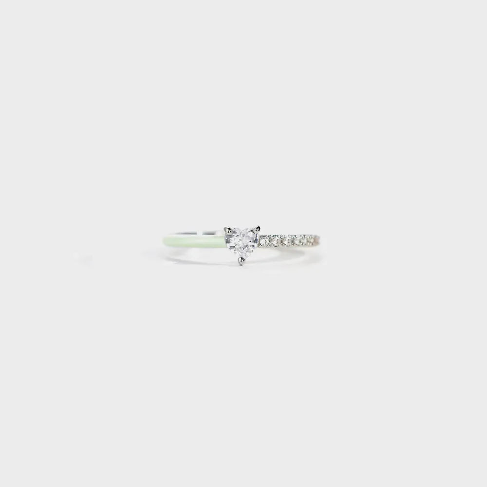 Sterling silver ring with heart-shaped stone and pave band, light green enamel detail