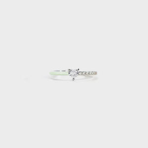 Sterling silver ring with heart-shaped stone and pave band, light green enamel detail