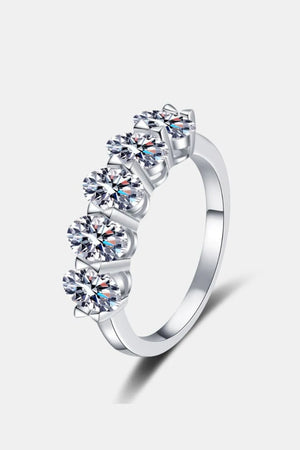 Silver moissanite band ring with five round-cut stones