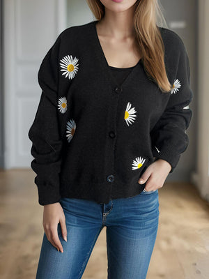 Black acrylic oversized knit cardigan with embroidered daisies, buttoned front, V-neck