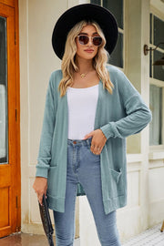 Air Force Blue cardigan with pockets and chevron pattern.