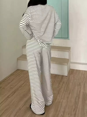 Chic striped two-piece lounge set in light gray with drawstring pants and long sleeves.