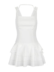 White mini dress with square neckline, fitted bodice and tiered ruffled hem.