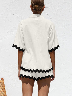 White linen co-ord set with scalloped trim on short sleeves and shorts