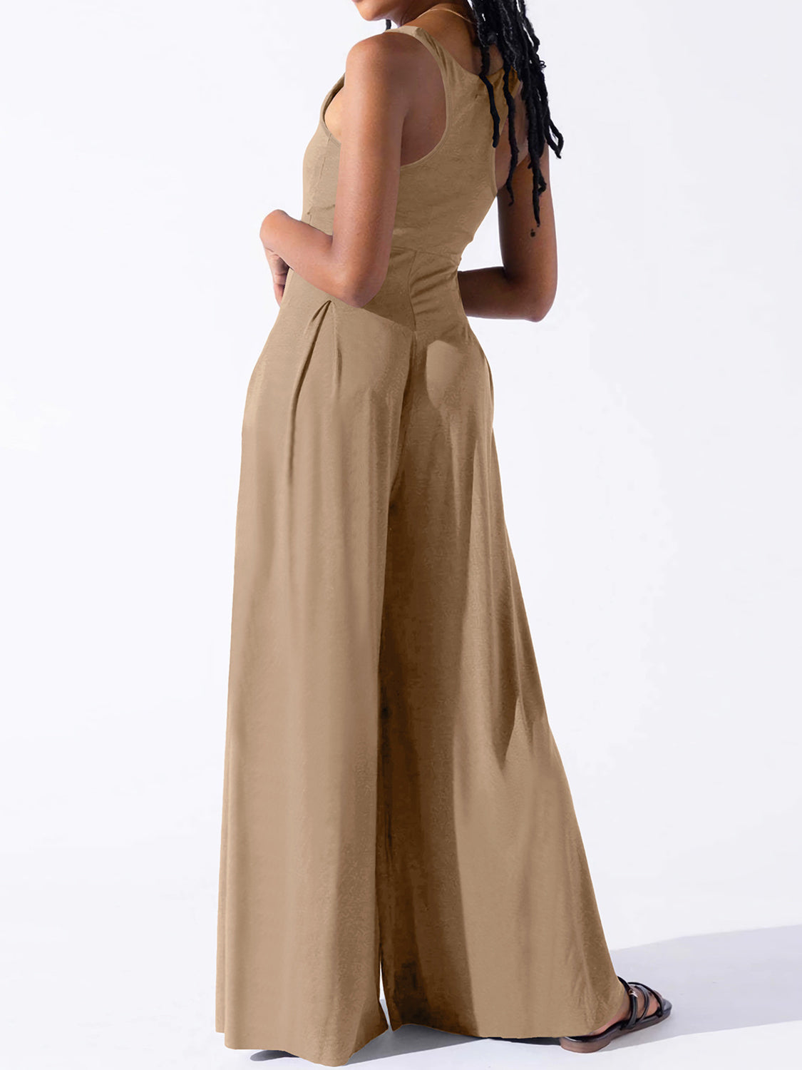 Camel square neck palazzo jumpsuit with wide legs and a cinched waist.