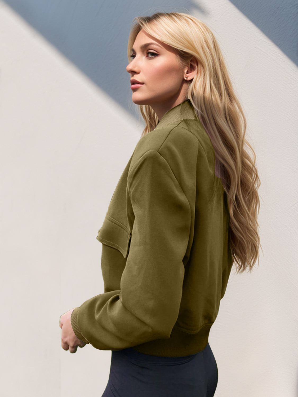 Boxy bomber jacket in moss green with patch pockets and a cropped fit.