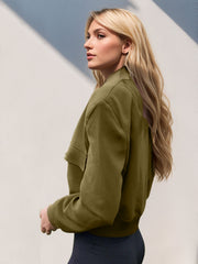 Boxy bomber jacket in moss green with patch pockets and a cropped fit.