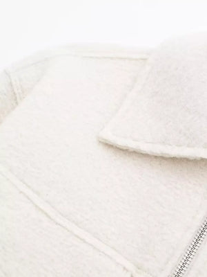White cropped zip-up jacket with collar and pockets detail