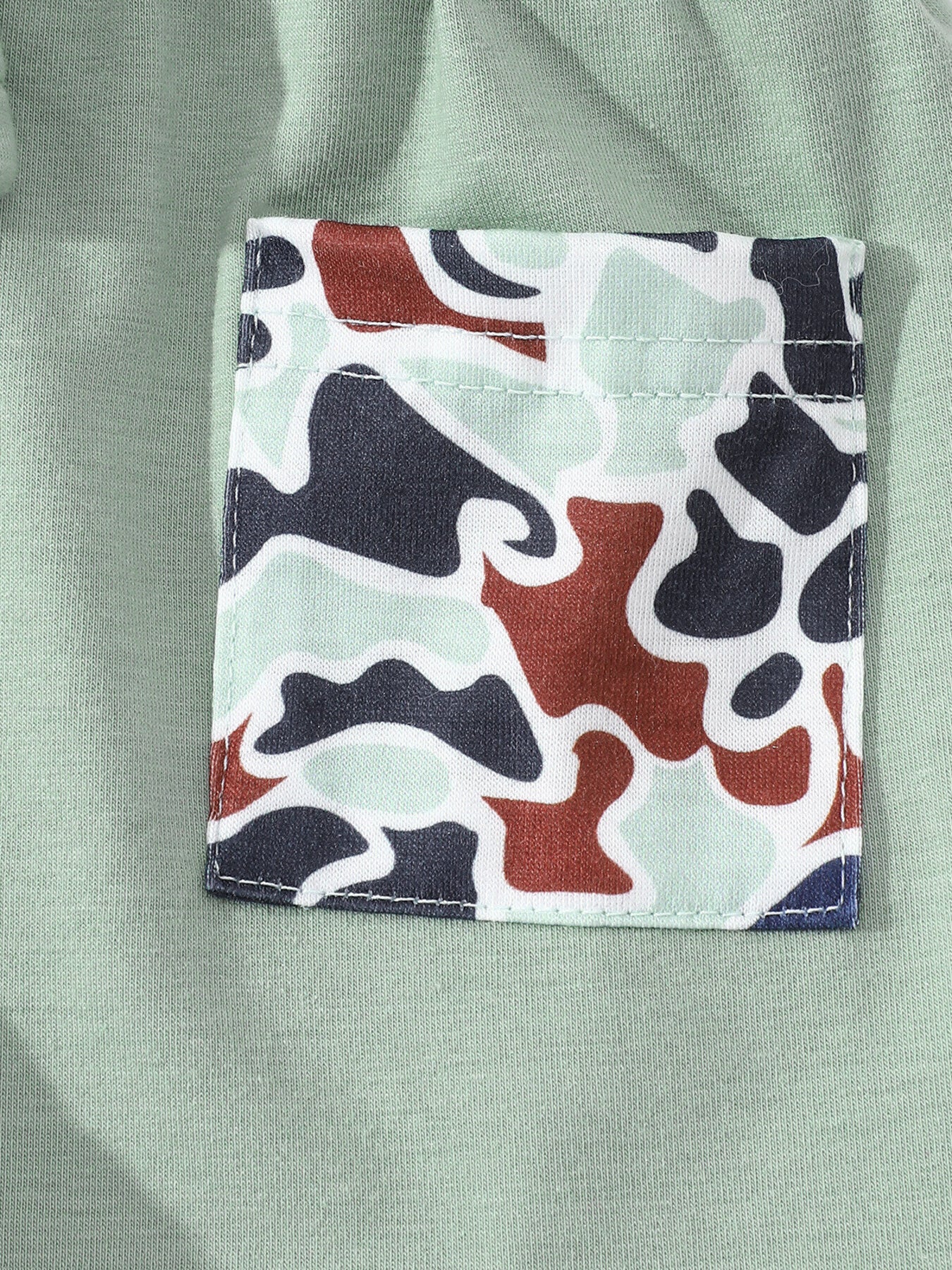 Sage green baby polo with camouflage pocket detail