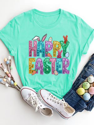 Aqua t-shirt with glitter Happy Easter graphic featuring bunny ears, carrots, and eggs.