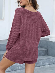 Ribbed knit lounge set in deep purple with long sleeves and shorts.