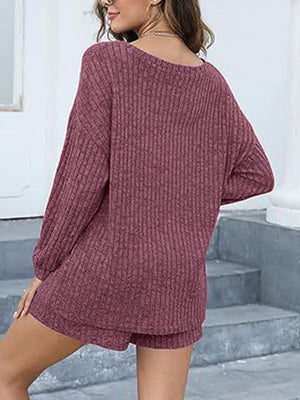 Ribbed knit lounge set in deep purple with long sleeves and shorts.