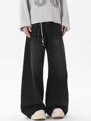 Men's black wide-leg jeans, 100% cotton, with a vintage wash and key chain detail.