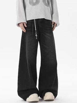 Men's black wide-leg jeans, 100% cotton, with a vintage wash and key chain detail.