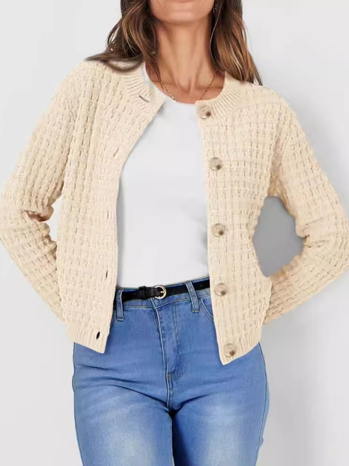 Textured knit button-up cardigan in tan with round neckline and button closure.