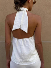 White textured backless halter cami with tie detail and elasticated neckline