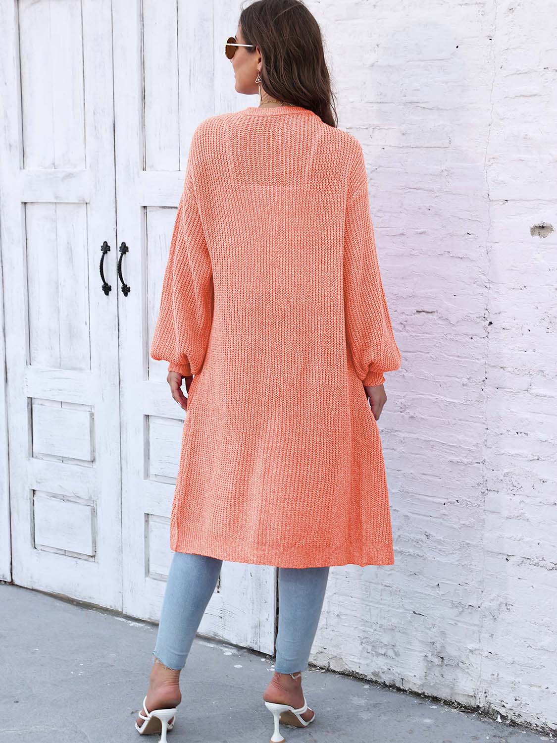 Ribbed knit maxi cardigan in Sherbet with long sleeves and pockets.
