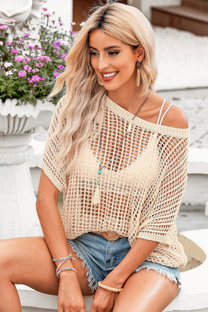 Open-knit boxy t-shirt in apricot with a relaxed fit and short sleeves, styled with denim shorts.