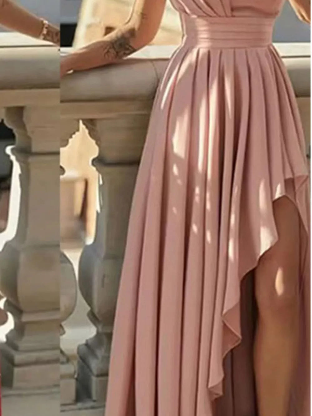 Dusty pink asymmetrical hem maxi dress with cinched waist and thigh-high slit.