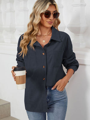 Dark Navy corduroy overshirt with patch pockets and button front, worn by a woman holding coffee.