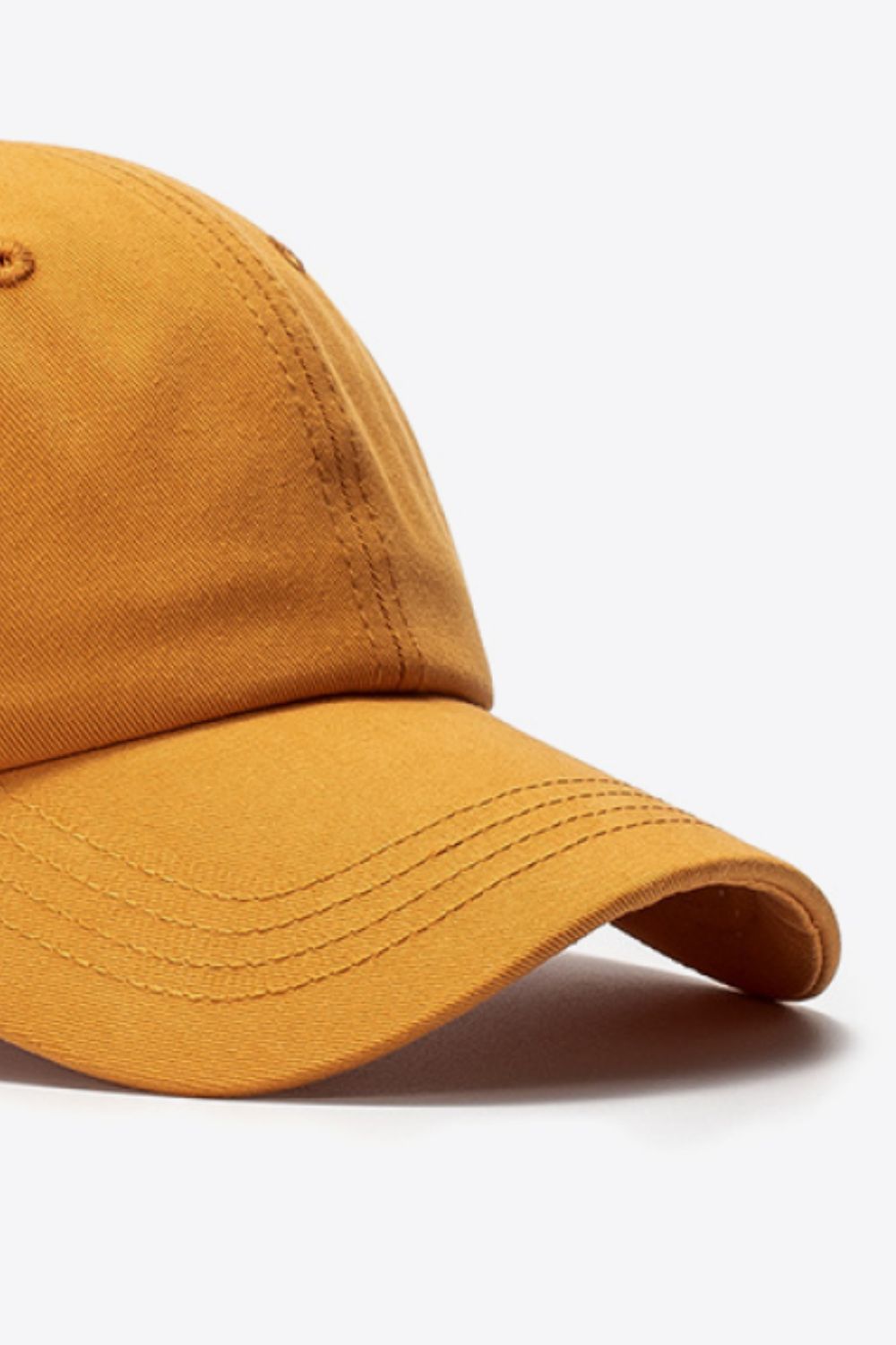 Khaki cotton baseball cap with stitched detail on brim
