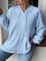 Light blue textured knit raglan hoodie with white drawstrings and a front pocket.