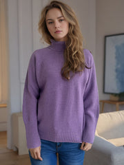 Purple ribbed turtleneck sweater with subtle sparkle detail and ribbed cuffs.