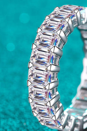 Emerald cut eternity band ring in silver with clear baguette stones