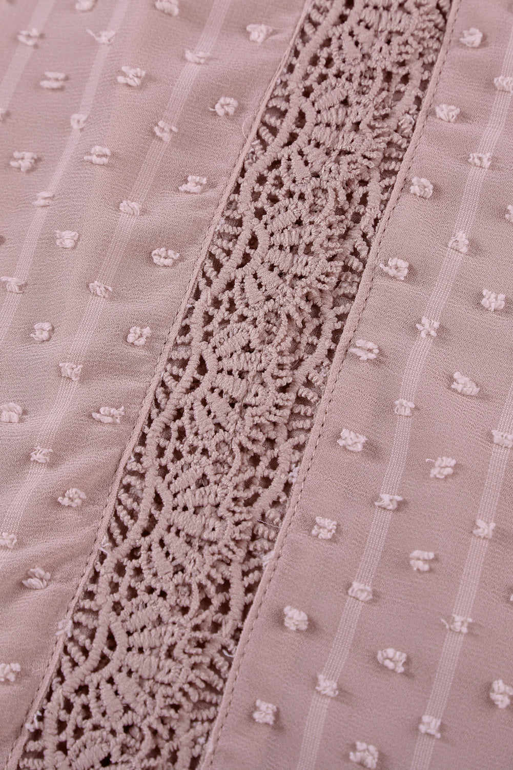 Dotted Swiss lace trim blouse in dusty pink with textured dots and vertical stripes.