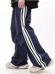 Navy wide-leg sweatpants for men with white side stripes and drawstring detail.