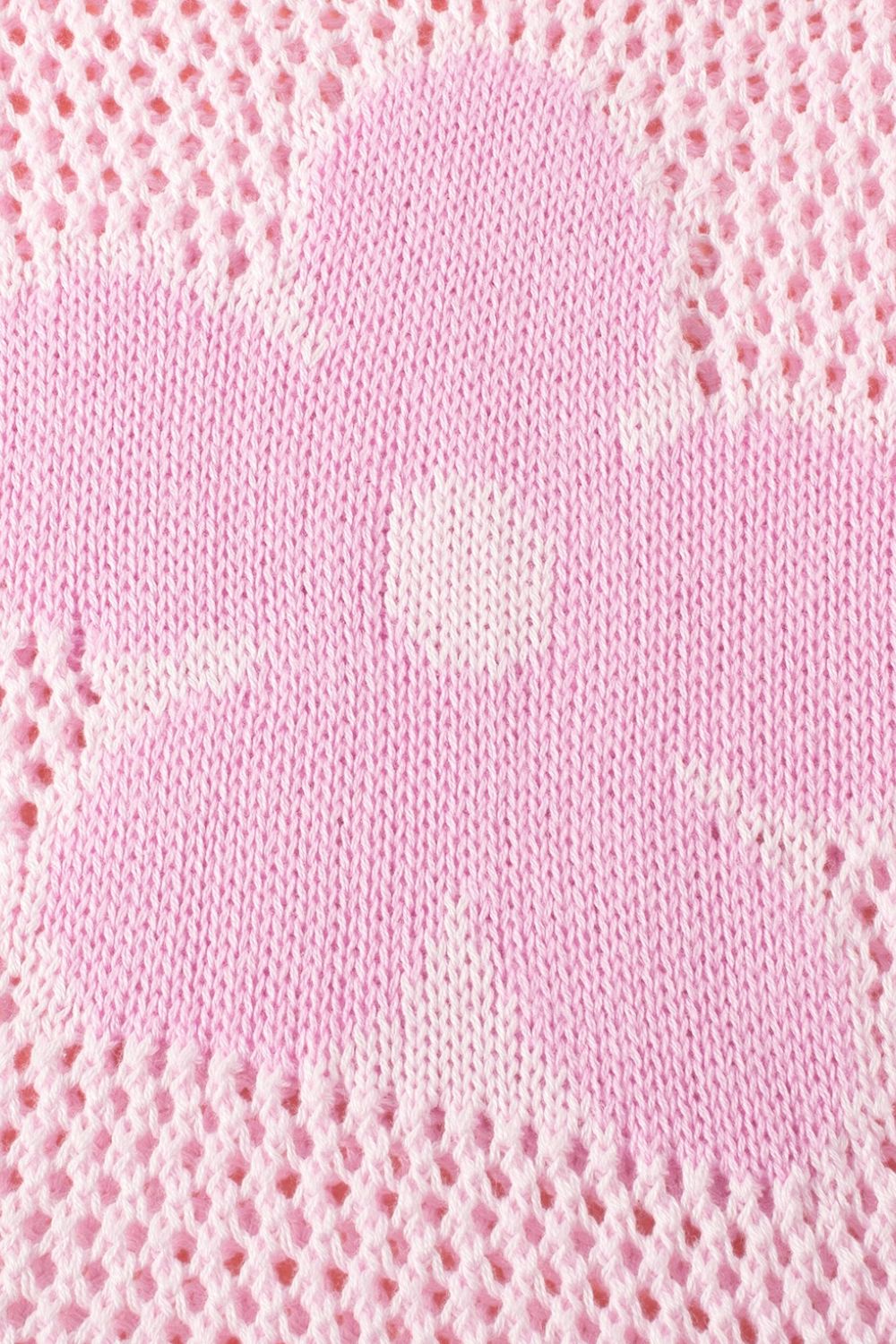 Openwork floral intarsia sweater in blush pink acrylic with a delicate open knit detail.