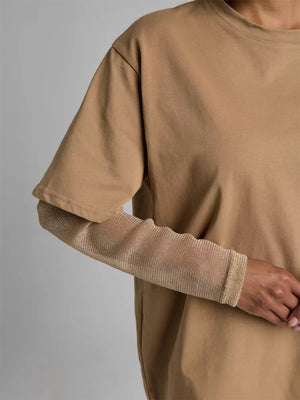 Camel oversized tee with sheer, textured sleeves.
