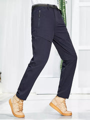 Men's dark blue sweatpants with zippered pockets and a relaxed fit.