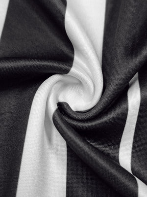 Plus size black and white striped maxi dress fabric detail