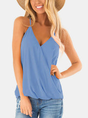 Misty blue draped crossover halter cami with V-neckline.